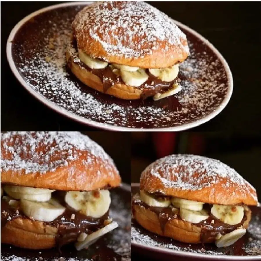 Croissant garni de chocolat et bananes, saupoudré de sucre glace.